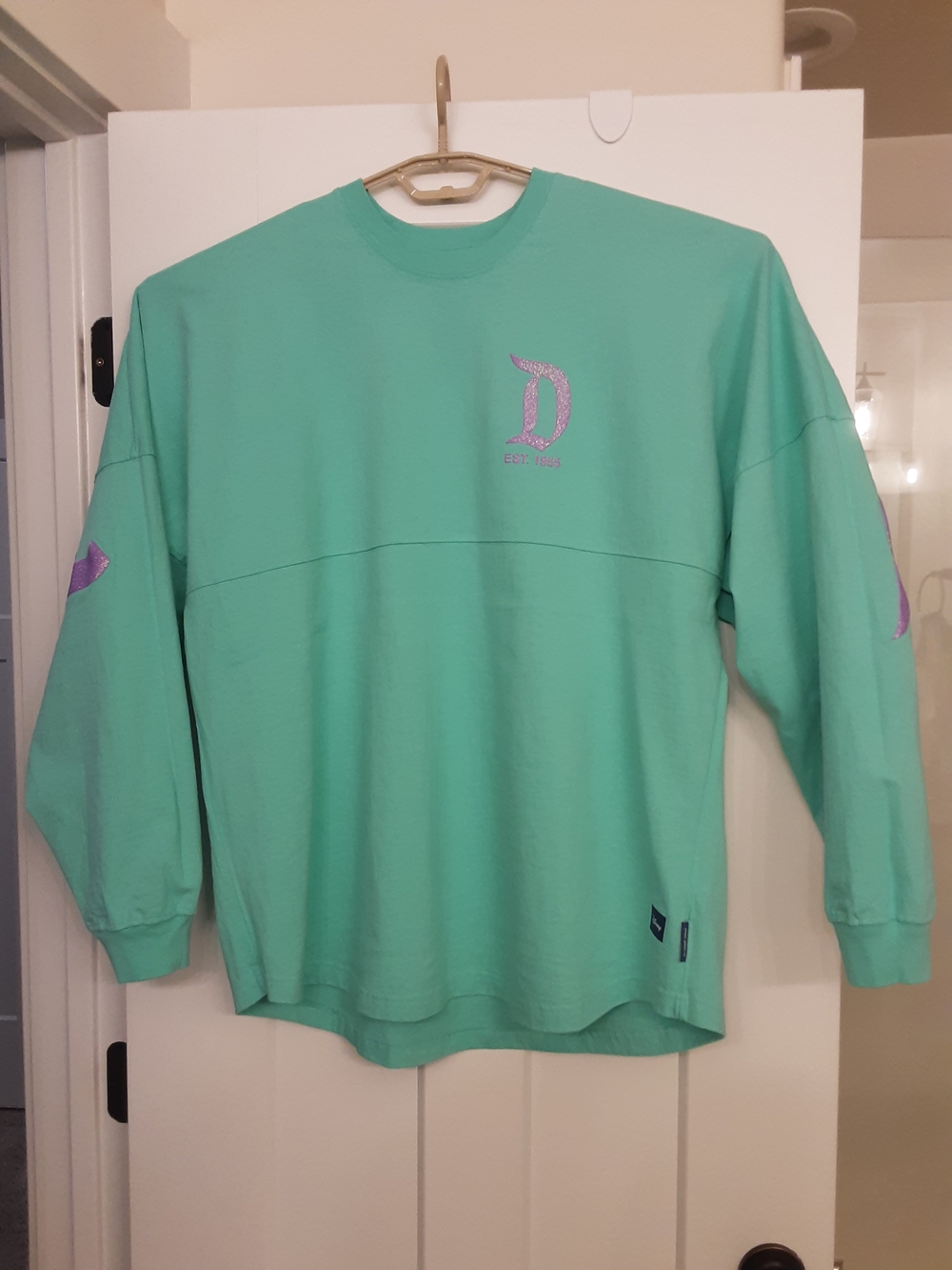 Disney Spirit Jersey Mint Green Long Sleeve Top with Purple Glitter Logo - Picture 2 of 2